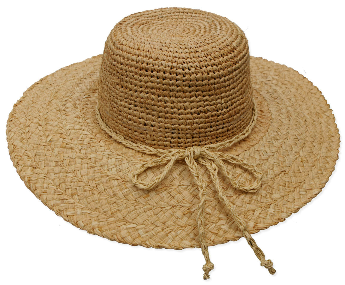 Beige straw hat with a wide brim and decorative string on a white background