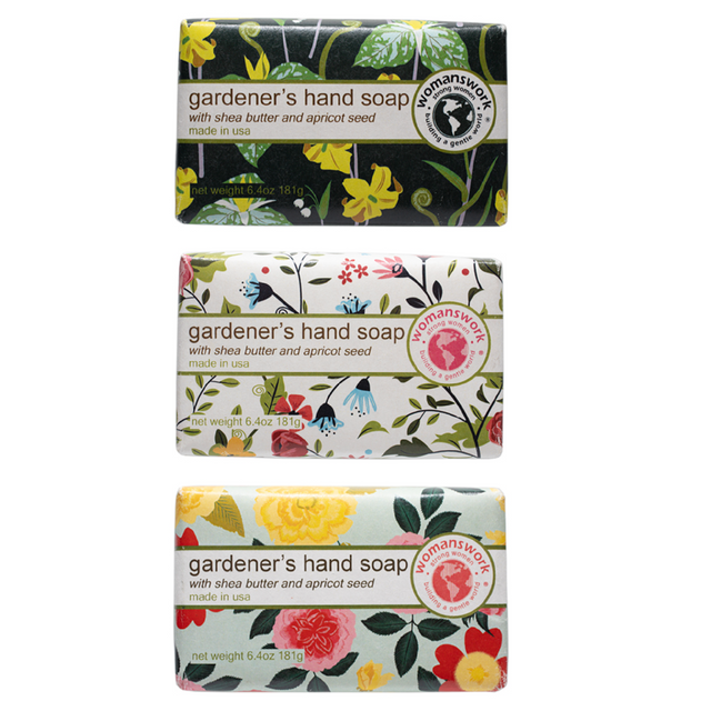 Three bars of 'Gardener's Hand Soap' with floral designs on a white background.
