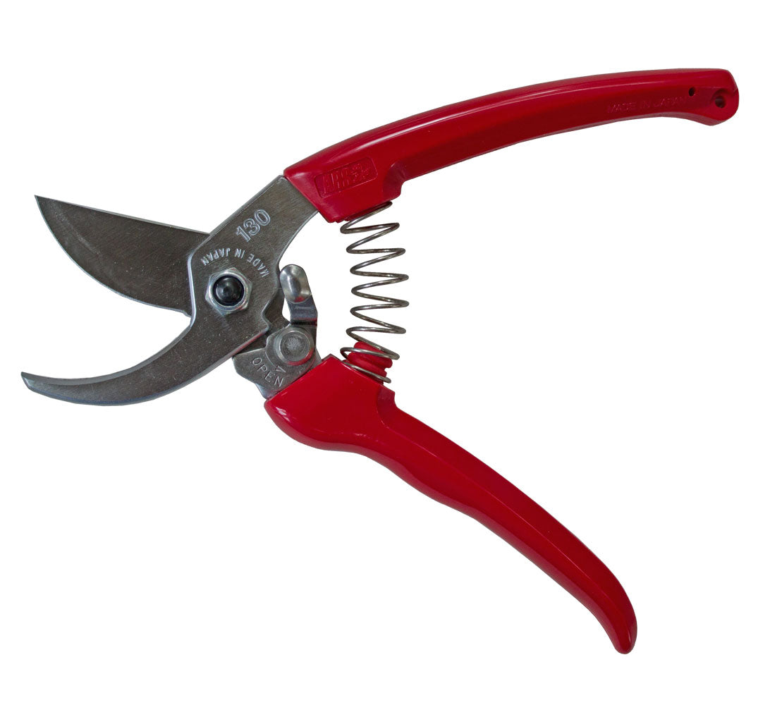 Red-handled pruning shears on a white background
