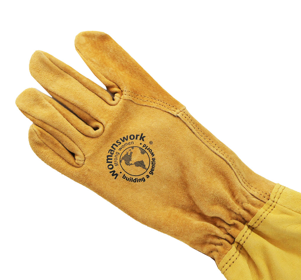 Yellow work glove with 'Womanwork' logo on a white background