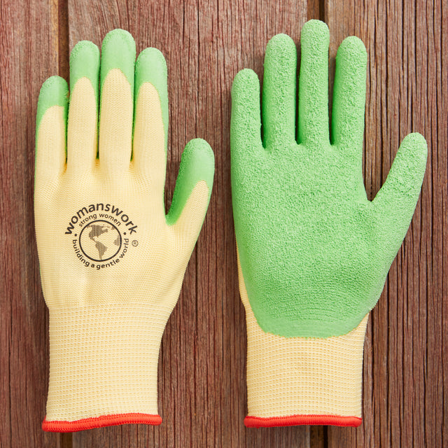 A pair of green latex gloves