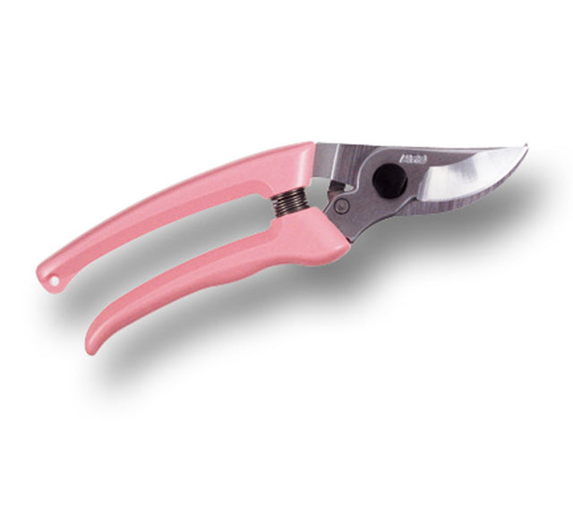 Pink gardening shears on a white background