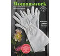 Gardening glove with 'Womanswork' branding and text about garden products on a magazine cover.